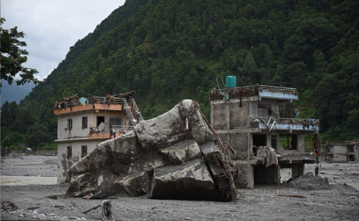 When a Border Disappears: Understanding the True Scale of the Bhotekoshi Collapse